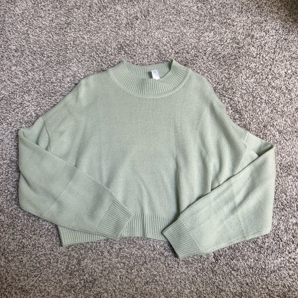 green sweater